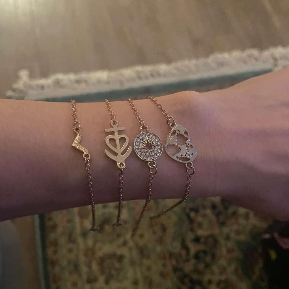 Bracelets (4) different charms